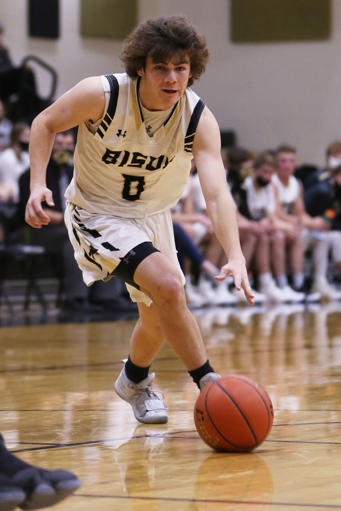 Anthony Peters dribbles toward the basket